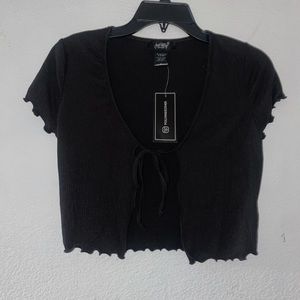 New black tie in the front top. Women’s size Small